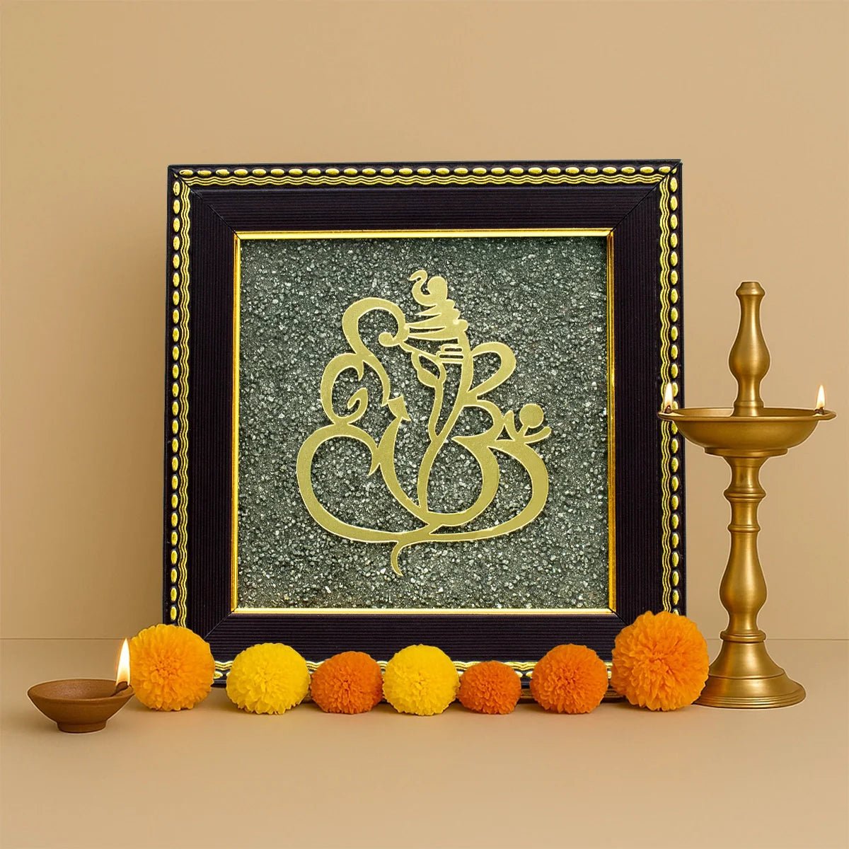 Ganesh Ji on raw pyrite frame for wealth and success - AstroGuruji
