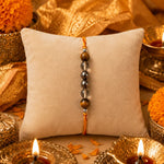 Prosperity & Abundance Rakhi. - AstroGuruji