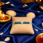 Turquoise Rakhi - AstroGuruji